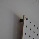 Spacers behind the peg board