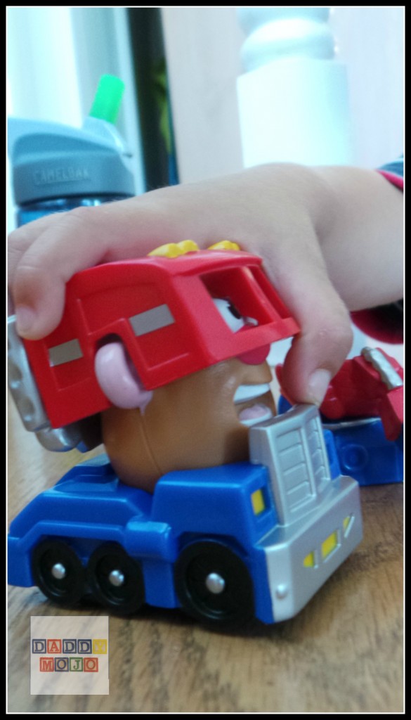 Small hands and Mr. Potato Head Transformer