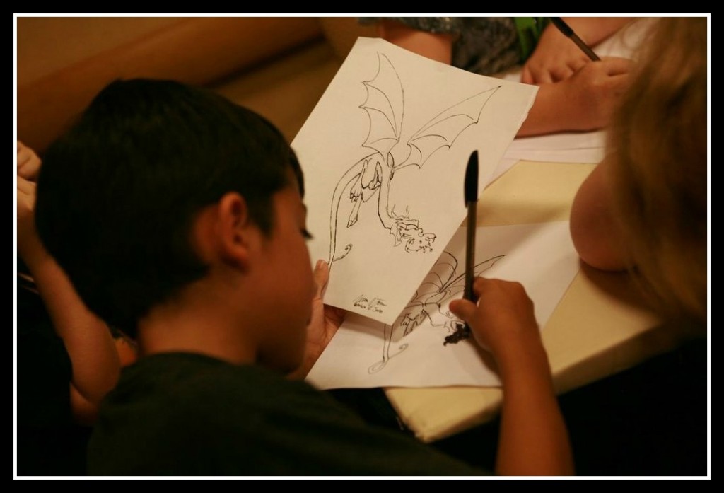 Drawing dragons workshop at Dragon Con