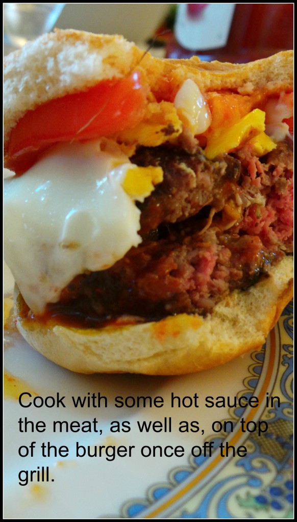 The burger, cooked with egg and El Yucateco