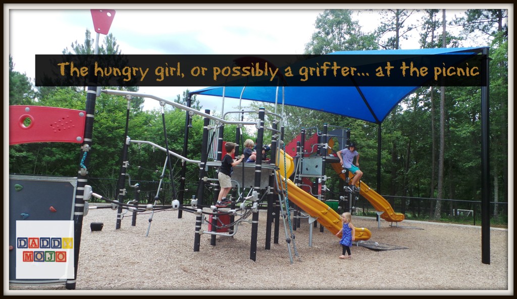 The hungry girl, or possibly a grifter... at the picnic